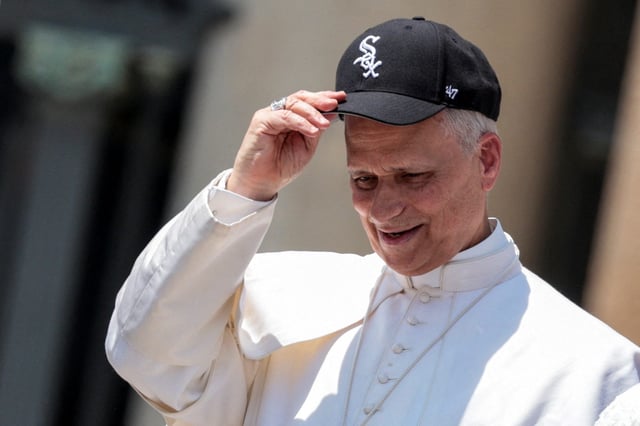 FILE PHOTO: Pope Leo XIV wears a Chicago White Sox cap, on the day of his general audience in St. Peter's Square, at the Vatican June 11, 2025. REUTERS/Remo Casilli  TPX IMAGES OF THE DAY/File Photo