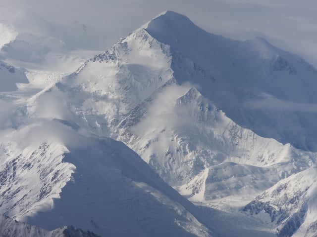 FILE - A view of one of the faces of North America's tallest peak, then-named Mount McKinley, in Denali National Park and Preserve, Alaska, Aug. 27, 2014. (AP Photo/Becky Bohrer, File)