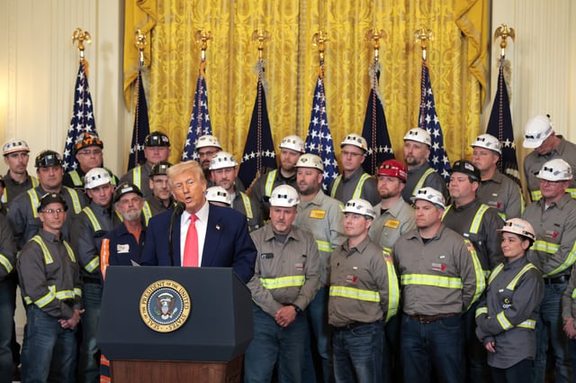 President Donald Trump speaks alongside coal and energy workers during an April executive order signing ceremony in the White House. The Trump administration has elected to roll back Biden-era environmental policies with the intention to help revive coal-fired plants.