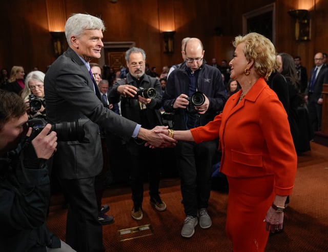 Senator Bill Cassidy (R-LA), chair of the Senate Health, Education, Labor, and Pensions (HELP) Committee, greeting Linda McMahon, President Donald Trump’s nominee for Secretary of Education, before she would testify in a confirmation hearing before the Senate Committee on Health, Education, Labor and Pensions on Feb. 13, 2025, in Washington. McMahon served as head of the U.S. Small Business Administration during Donald Trump's first presidential administration and was CEO of World Wrestling Entertainment.
