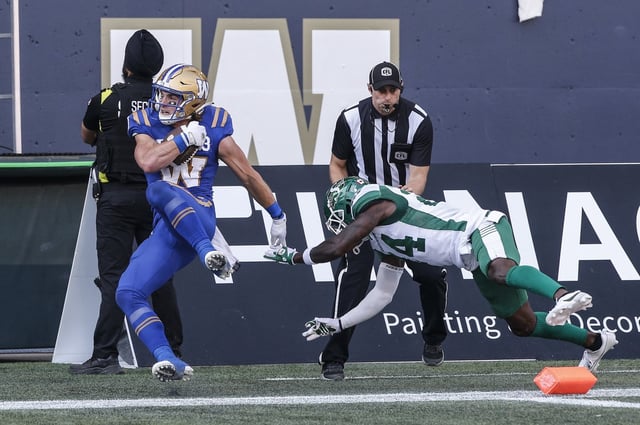 Winnipeg Blue Bombers' Dalton Schoen (83) catches a touchdown pass during the first half of CFL football action against the Saskatchewan Roughriders in Winnipeg Saturday, September 9, 2023.    THE CANADIAN PRESS/John Woods