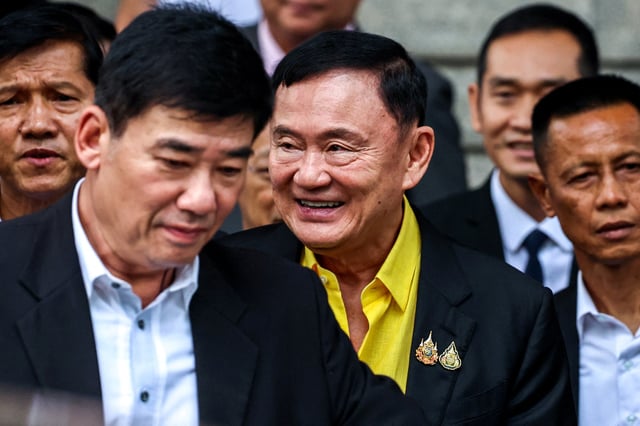 Former Thailand Prime Minister Thaksin Shinawatra leaves the Criminal court after appearing for the hearing of a lese majeste case, also known as a royal insult case in Bangkok, Thailand, August 19, 2024. REUTERS/Athit Perawongmetha/File Photo