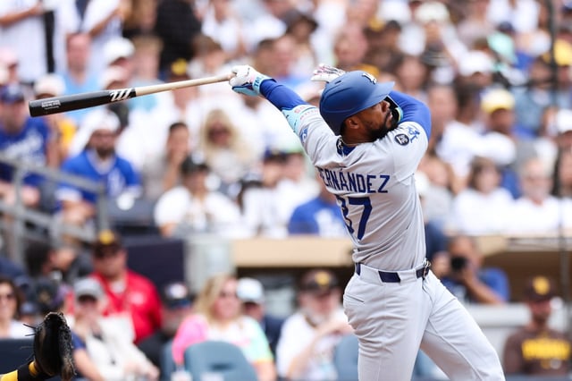 The Dodgers’ Teoscar Hernandez hits a three-run home run during the sixth inning of their game against the San Diego Padres on Wednesday afternoon in San Diego. (AP Photo/Derrick Tuskan)