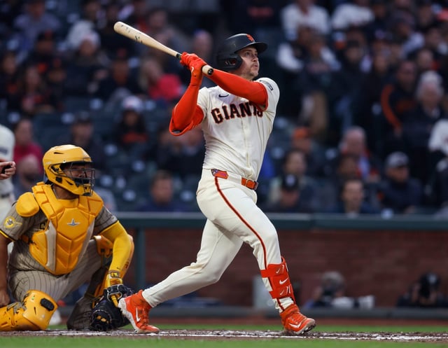 San Francisco Giants’ Patrick Bailey (14) hits an RBI double against the San Diego Padres in the fifth inning at Oracle Park in San Francisco, Calif., on Wednesday, June 4, 2025. (Nhat V. Meyer/Bay Area News Group)