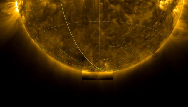 Ultraviolet image of the Sun’s lower half, with its south pole highlighted, showing glowing coronal loops.