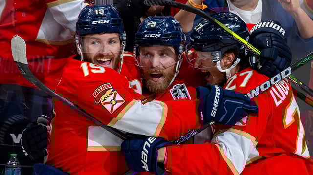 Florida Panthers center Sam Bennett (9) celebrates with teammates Matthew Tkachuk (19) and Eetu Luostarinen (27) after scoring against the Edmonton Oilers during the second period of Game 3 in the Stanley Cup Final at Amerant Bank Arena on Monday, June 9, 2025, in Sunrise, Fla.