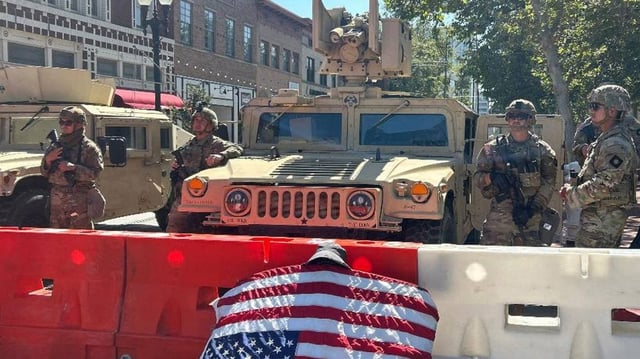 A group of protesters engage in a standoff with law enforcement officers outside a federal building in downtown Santa Ana, Calif., on Wednesday. Photo by Lori Shepler/UPI