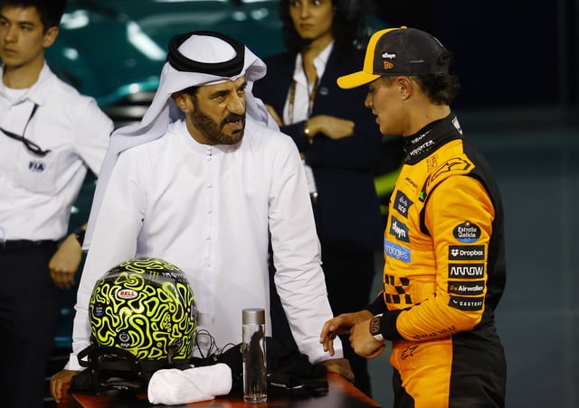 Formula One F1 - Bahrain Grand Prix - Bahrain International Circuit, Sakhir, Bahrain - April 13, 2025 FIA President Mohammed Ben Sulayem with third placed McLaren's Lando Norris after the Bahrain Grand Prix REUTERS/Rula Rouhana/File Photo