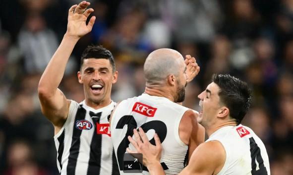 Scott Pendlebury, Steele Sidebottom and Bryaden Maynard during the win over the Bulldogs in March..