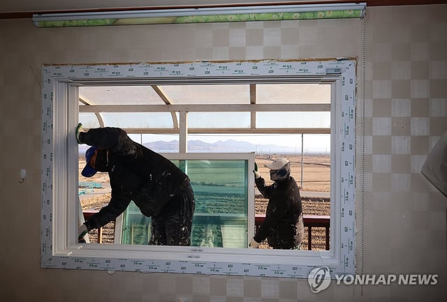 This Jan. 2, 2025, file photo shows a soundproof window being installed at a house in the border county of Ganghwa in Incheon against North Korea's broadcasts of loud noises. (Yonhap)