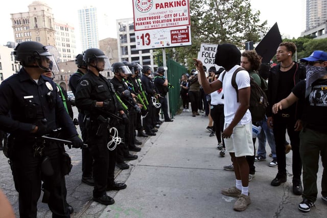 Protesters rally during a demonstration in response to a series of  U.S. Immigration and Customs Enforcement (ICE) raids throughout the country in Los Angeles, Calif., on Wednesday, June 11th, 2025.