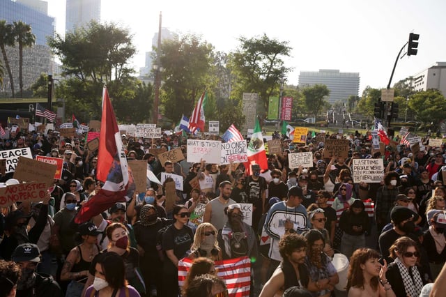 Protesters rally during a demonstration in response to a series of  U.S. Immigration and Customs Enforcement (ICE) raids throughout the country in Los Angeles, Calif., on Wednesday, June 11th, 2025.