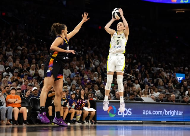 Jun 11, 2025; Phoenix, Arizona, USA; Dallas Wings guard Paige Bueckers (5) against the Phoenix Mercury in the second half at PHX Arena. Mandatory Credit: Mark J. Rebilas-Imagn Images