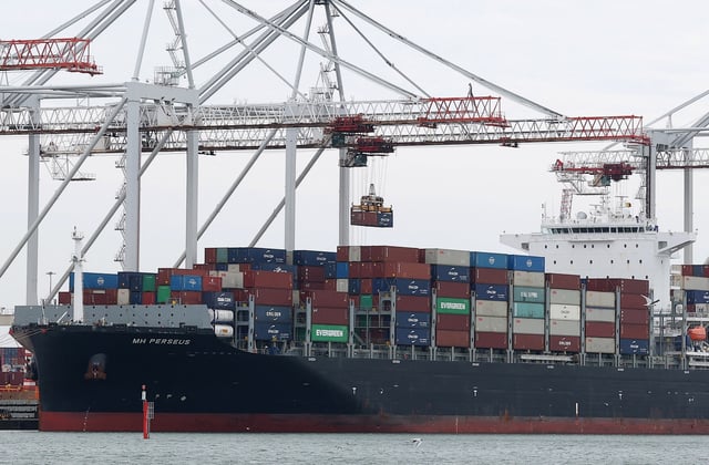 Cargo is loaded onto the container ship MH Perseus, following its arrival from New Orleans, U.S., at the Port of Southampton, Southampton, Britain, April 3, 2025. REUTERS/Toby Melville/File Photo