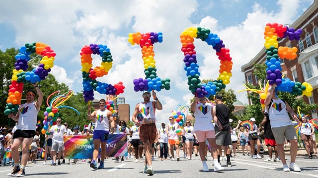 The Morgan Stanley float participants walk June 25, 2022, during the Baltimore Pride Parade on Charles Street.
