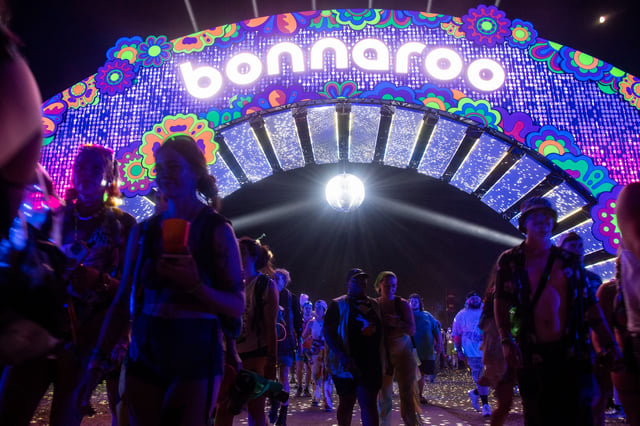 Festival goers exit on the last night of Bonnaroo in Manchester, Tenn., Sunday, June 16, 2024.