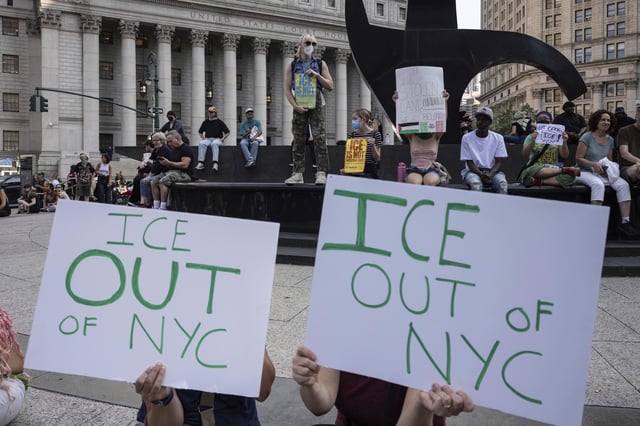 Demonstrators hold signs and chant during a protest against deportation by Immigration and Customs Enforcement in New York, Wednesday, June 11, 2025. (AP Photo/Yuki Iwamura)