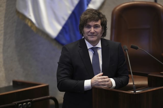 Argentina's President Javier Milei addresses lawmakers in the Knesset, Israel's parliament, in Jerusalem, Wednesday, June 11, 2025. (AP Photo/Ohad Zwigenberg)
