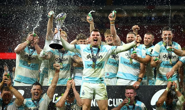 Rugby Union - European Challenge Cup Final - Bath Rugby v Lyon - Principality Stadium, Cardiff, Wales, Britain - May 23, 2025 Bath Rugby's Ben Spencer lifts the trophy as he celebrates winning European Challenge Cup with teammates Action Images via Reuters/Andrew Boyers/File Photo