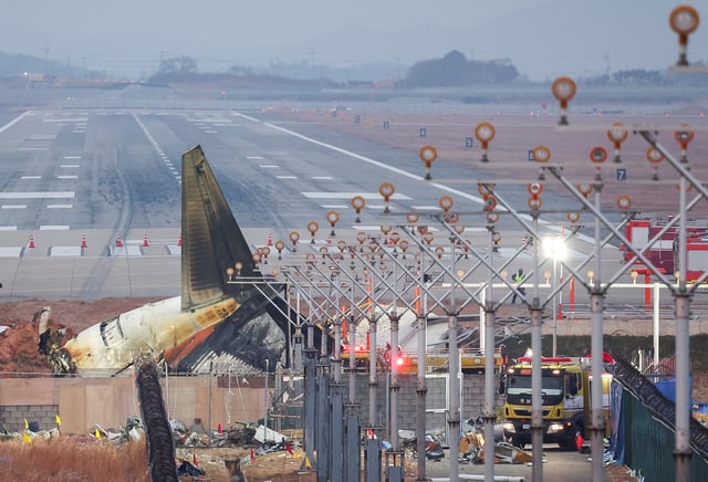 The wreckage of the Jeju Air aircraft that went off the runway and crashed lies at Muan International Airport, in Muan, South Korea, December 30, 2024. REUTERS/Kim Hong-Ji
