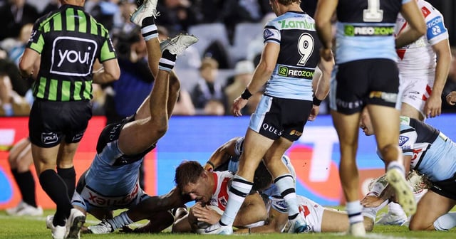 St George Illawarra Dragons forward Jack de Belin scores a try against the Cronulla Sharks in their round 15 NRL match at Sharks Stadium on Thursday, June 12, 2025. Picture by Cameron Spencer/Getty Images.