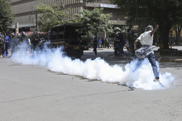 Demonstrators protest over the death in police custody of blogger Albert Ojwang, in Nairobi, Kenya, Thursday, June 12, 2025. (AP Photo/Andrew Kasuku)