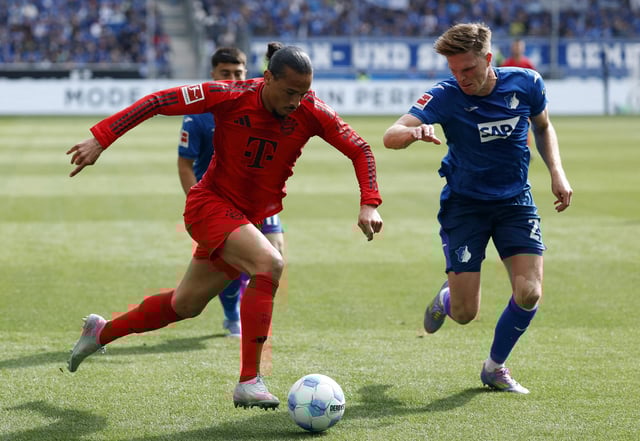 Soccer Football - Bundesliga - TSG 1899 Hoffenheim v Bayern Munich - PreZero Arena, Sinsheim, Germany - May 17, 2025  TSG 1899 Hoffenheim's Marius Bulter in action with Bayern Munich's Leroy Sane REUTERS/Heiko Becker/File Photo