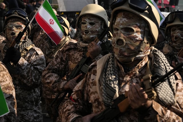Members of the Iranian Basij paramilitary force attend a force parade in Tehran, Iran, Friday, Jan. 10, 2025.