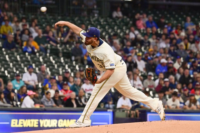 Jun 9, 2025; Milwaukee, Wisconsin, USA; Milwaukee Brewers starting pitcher Aaron Civale (32) throws a pitch in the first inning against the Atlanta Braves at American Family Field. Mandatory Credit: Benny Sieu-Imagn Images
