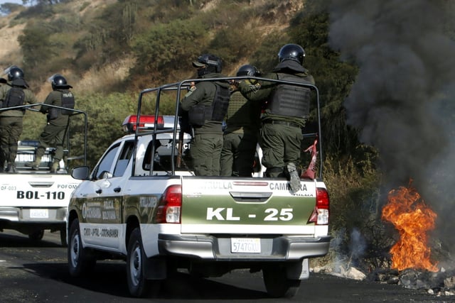 Several dozen people have been injured and four officers killed
