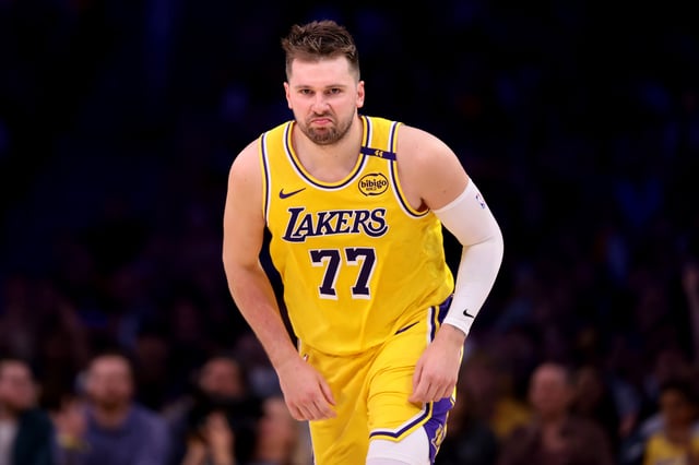 Luka Doncic #77 of the Los Angeles Lakers reacts after a basket during the third quarter against the Houston Rockets at Crypto.com Arena on April 11, 2025 in Los Angeles, California.