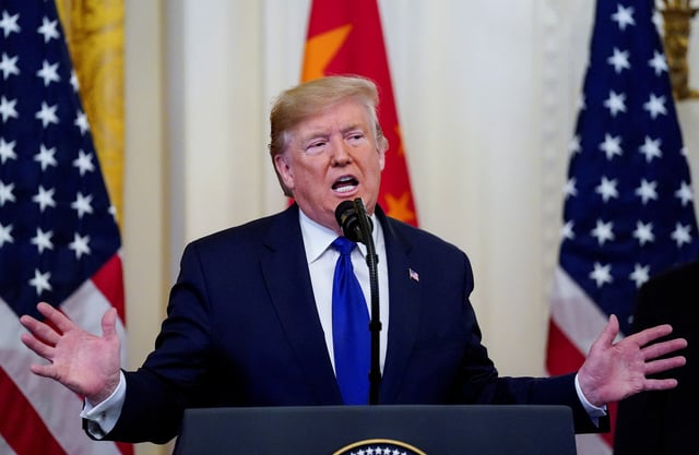 U.S. President Donald Trump speaks prior to signing "phase one" of the U.S.-China trade agreement in the East Room of the White House in Washington, U.S., January 15, 2020. REUTERS/Kevin Lamarque/File Photo
