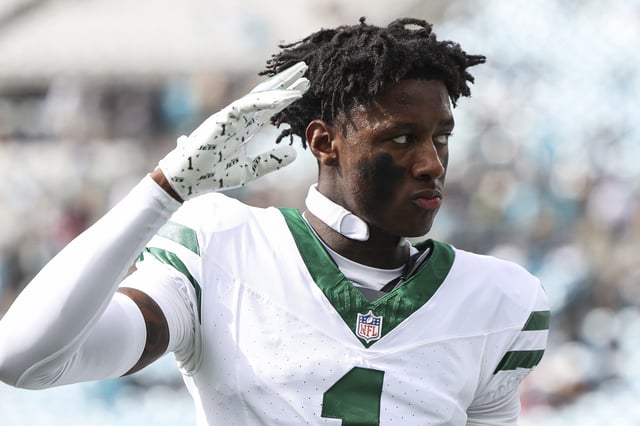 JACKSONVILLE, FLORIDA - DECEMBER 15: Sauce Gardner #1 of the New York Jets walks off of the field after warming up prior to an NFL football game against the Jacksonville Jaguars at EverBank Stadium on December 15, 2024 in Jacksonville, FL. 
Sauce Gardner appears to take shots at his own team on social media.