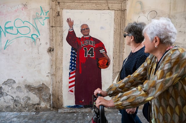 A new mural by street artist TVBoy depicts Pope Leo XIV as a Chicago Bulls fan.