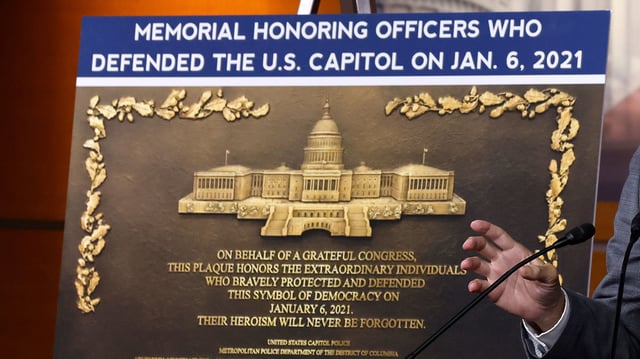 This May 2024 photo shows a display of a a memorial plaque honoring law enforcement officers who defended the US Capitol during the January 6, 2021 attack.