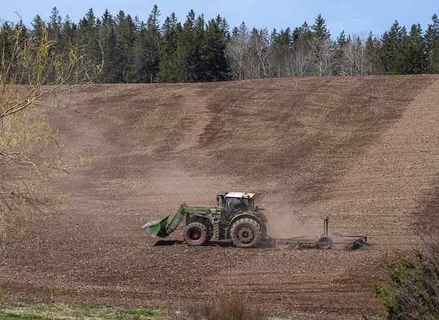 A farmer works a field in Churchville, N.S. on Monday, May 9, 2022. THE CANADIAN PRESS/Andrew Vaughan