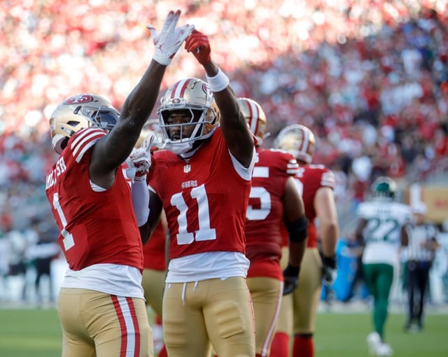 San Francisco 49ers’ Deebo Samuel Sr. (1) celebrates with teammate Brandon Aiyuk (11) after scoring a touchdown in the second quarter of their NFL game against the New York Jets at Levi’s Stadium on Monday, Sept. 9, 2024. (Jane Tyska/Bay Area News Group)