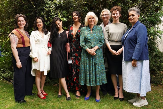 Britain's Queen Camilla poses with Kit de Waal, chair of the fiction jury and the shortlisted authors for the fiction prize at the Women's Prize for Fiction and Nonfiction event in London, Britain, June 11, 2025.
