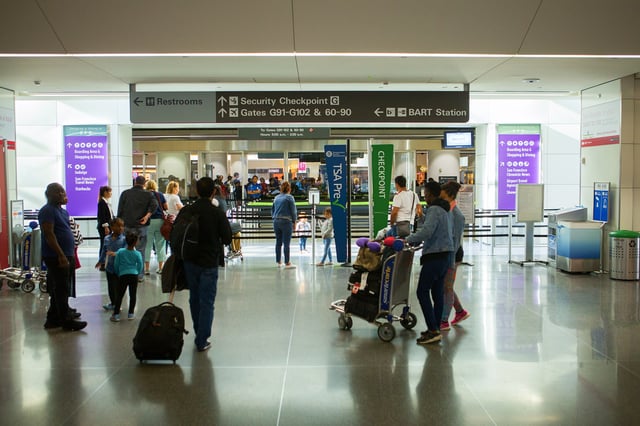 FILE: Travelers arrive at San Francisco International Airport in 2017. On Thursday, June 12, 2025, protesters at SFO called for the release of Palestinian visitors who were detained on an interfaith humanitarian mission.