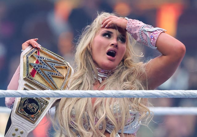 LAS VEGAS, NEVADA - APRIL 19: Tiffany Stratton holds up her belt as she celebrates her victory over Charlotte Flair in their WWE Women&#39;s Championship match during WrestleMania 41 at Allegiant Stadium on April 19, 2025 in Las Vegas, Nevada.