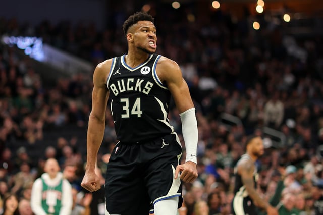 Giannis Antetokounmpo #34 of the Milwaukee Bucks reacts to a score during the first half of a game against the Boston Celtics at Fiserv Forum. Antetokounmpo is still contemplating his future in Milwaukee.