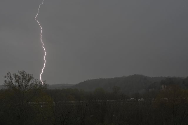 Lightning strikes as storms move through the area Wednesday, April 2, 2025, in Ashland City, Tenn. THE CANADIAN PRESS/AP-George Walker IV
