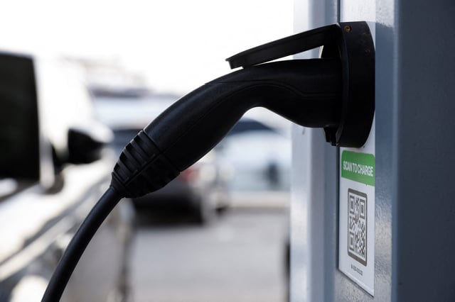 A view of an electric vehicle plugged into a public charging station in Ta' Xbiex, Malta November 9, 2023. REUTERS/Darrin Zammit Lupi/File Photo
