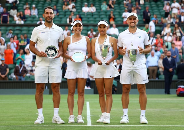 Tennis - Wimbledon - All England Lawn Tennis and Croquet Club, London, Britain - July 14, 2024 Winners Poland's Jan Zielinski and Taiwan's Su-Wei Hsieh and runners up Mexico's Santiago Gonzalez and Giuliana Olmos pose for a picture with their trophies after the mixed doubles final REUTERS/Hannah Mckay/File Photo