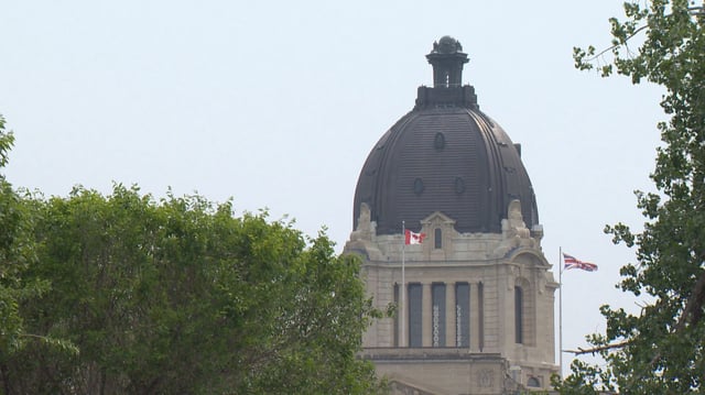 Regina's Legislature building surrounded by smoke. 