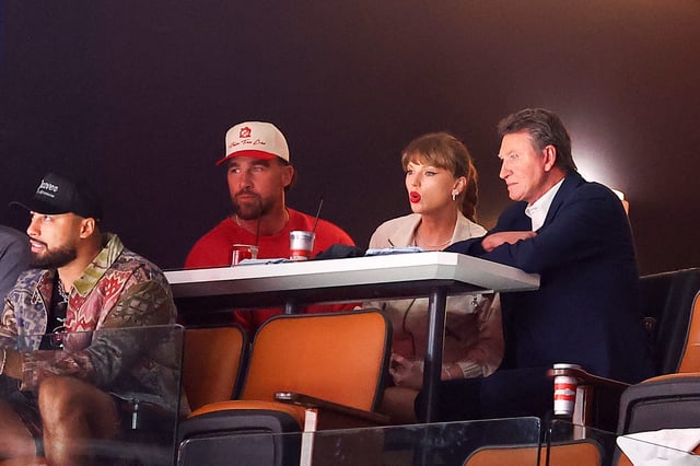 Travis Kelce, Taylor Swift and Wayne Gretzky sit together during the second period as the Edmonton Oilers and the Florida Panthers play in Game Four of the 2025 Stanley Cup Final at Amerant Bank Arena on June 12, 2025, in Sunrise, Florida.
