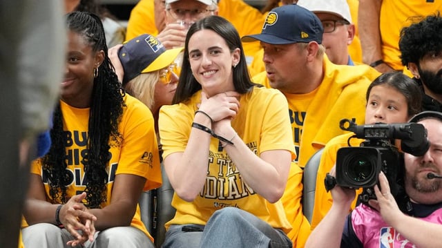 Caitlin Clark attends game three of the 2025 NBA Finals between the Oklahoma City Thunder and the Indiana Pacers at Gainbridge Fieldhouse. Mandatory Credit: Kyle Terada-Imagn Images