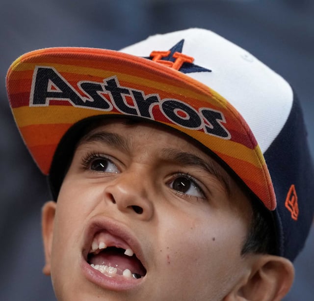 Houston Astros fan Cade Briones is seen before an MLB baseball game in Houston, Thursday, June 12, 2025.