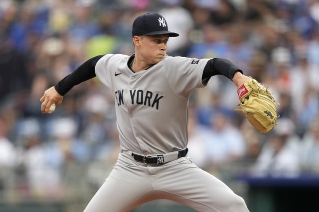 New York Yankees starting pitcher Will Warren throws in the first inning of a baseball game against the Kansas City Royals, Thursday, June 12, 2025, in Kansas City, Mo. (AP Photo/Ed Zurga)