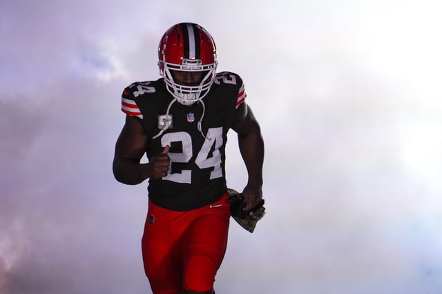Nick Chubb #24 of the Cleveland Browns runs out of the tunnel prior to an NFL football game against the Pittsburgh Steelers at Huntington Bank Field on November 21, 2024 in Cleveland, Ohio.